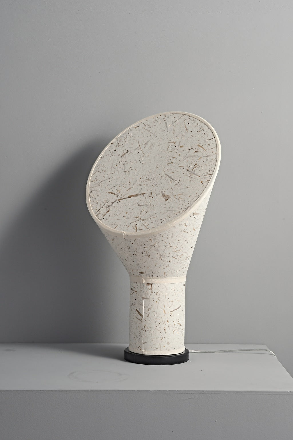 Serevane white fiber paper table lamp unlit in the real studio