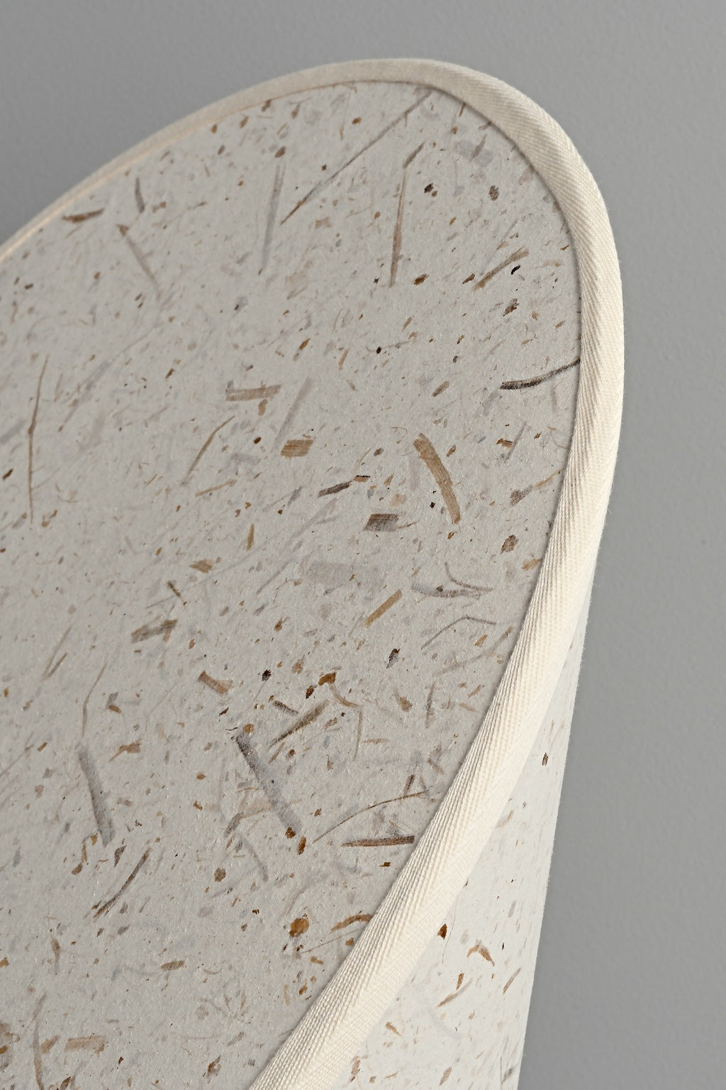 Serevane unlit white fiber paper surface and botanical inclusion detail