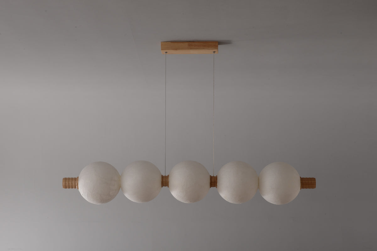 5-globe horizontal natural mulberry silk pendant with light wood details, real product photograph