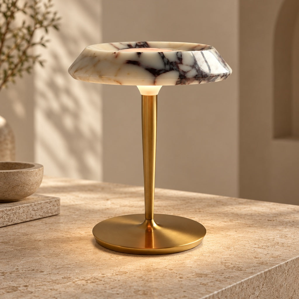Solvenne burgundy-veined marble table lamp on a warm neutral surface