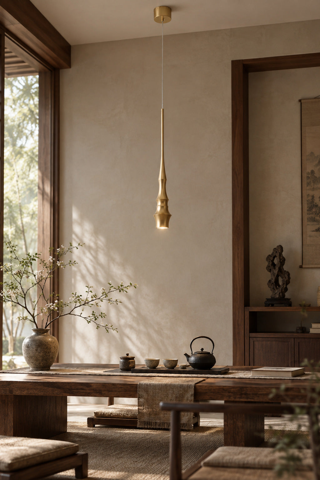 Torvelle Brushed Gold Sculptural Pendant Light in a styled interior scene 2 · CDE expanded 2026-09-21