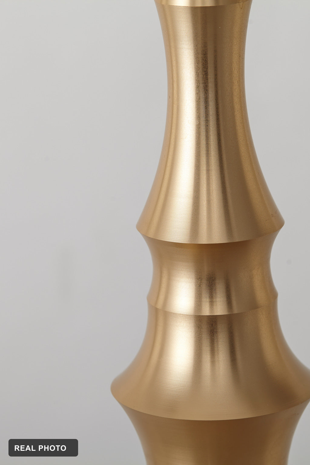 Torvelle Brushed Gold Sculptural Pendant Light real product photo 2 — REAL PHOTO · CDE corrected 2026-09-24