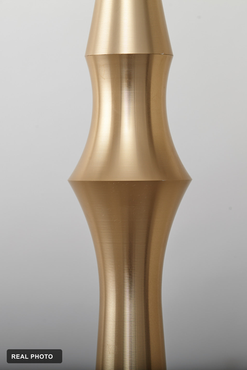 Torvelle Brushed Gold Sculptural Pendant Light real product photo 8 — REAL PHOTO · CDE corrected 2026-09-24