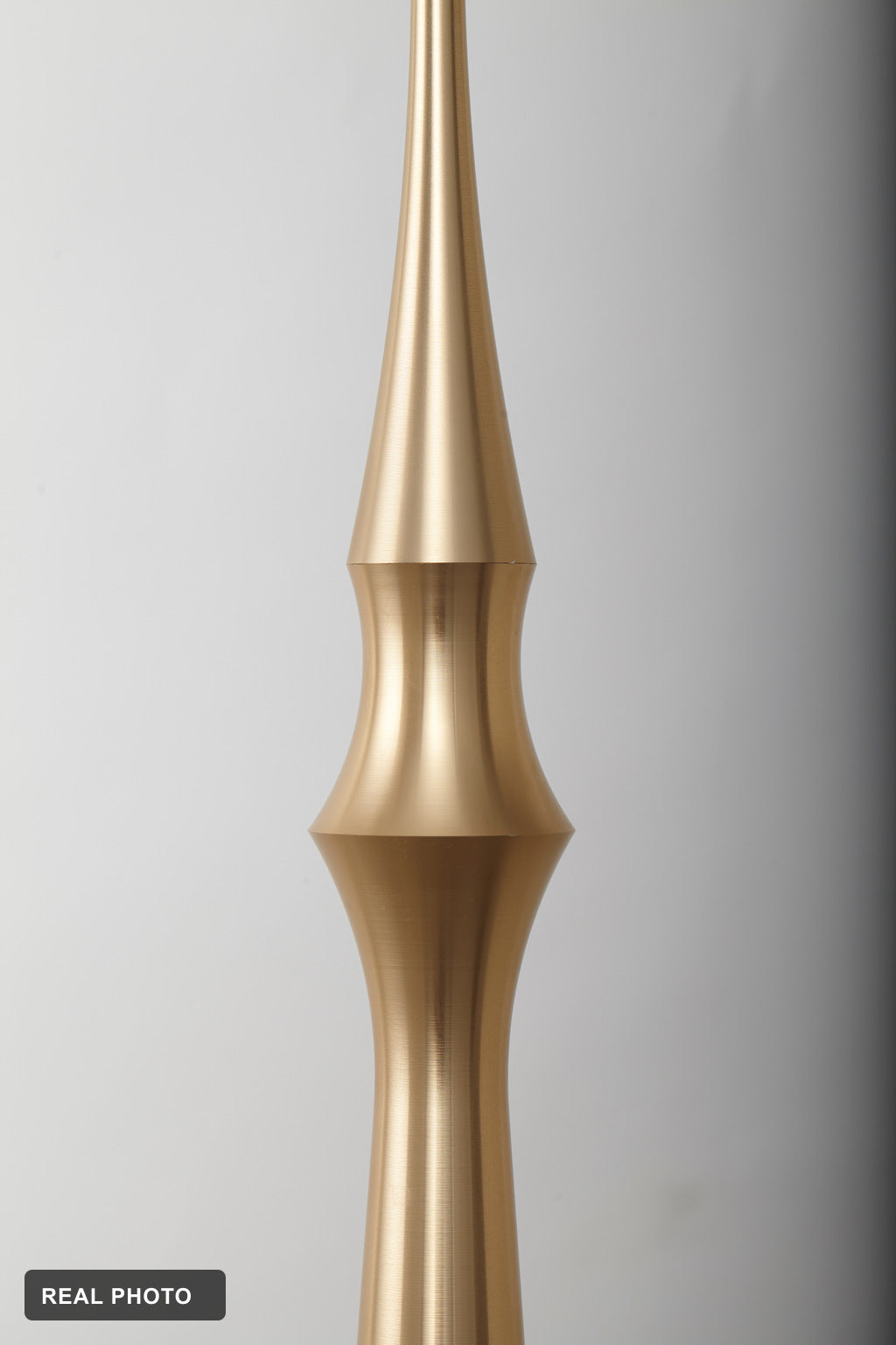 Torvelle Brushed Gold Sculptural Pendant Light real product photo 9 — REAL PHOTO · CDE corrected 2026-09-24