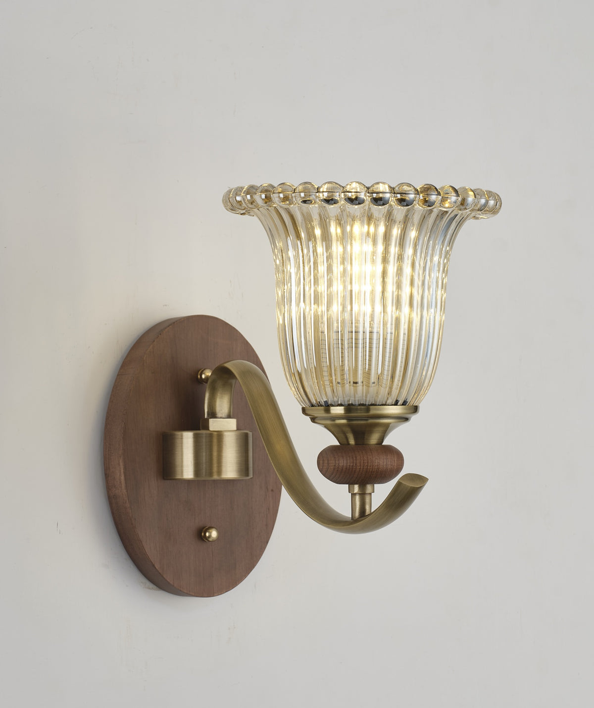 Tullienne wall sconce - real three-quarter lit product photograph