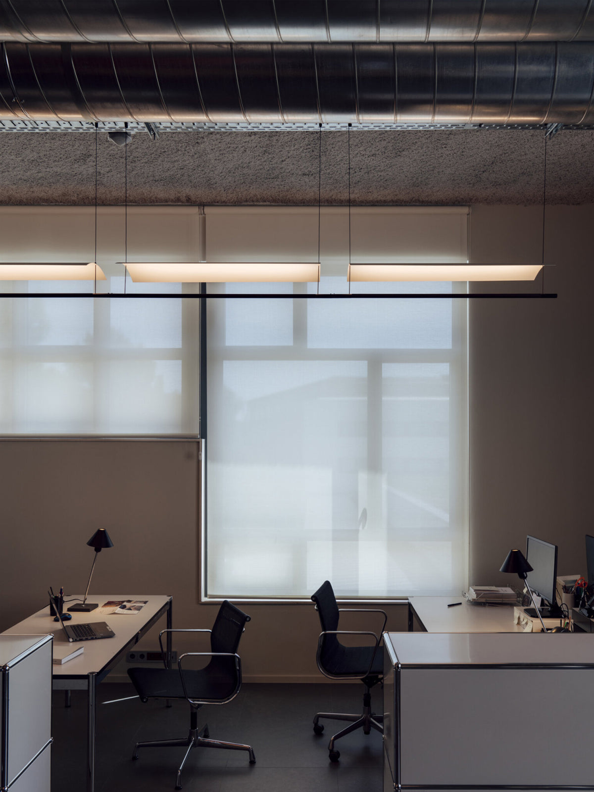Veilane lighting collection in an office interior; configuration shown for inspiration