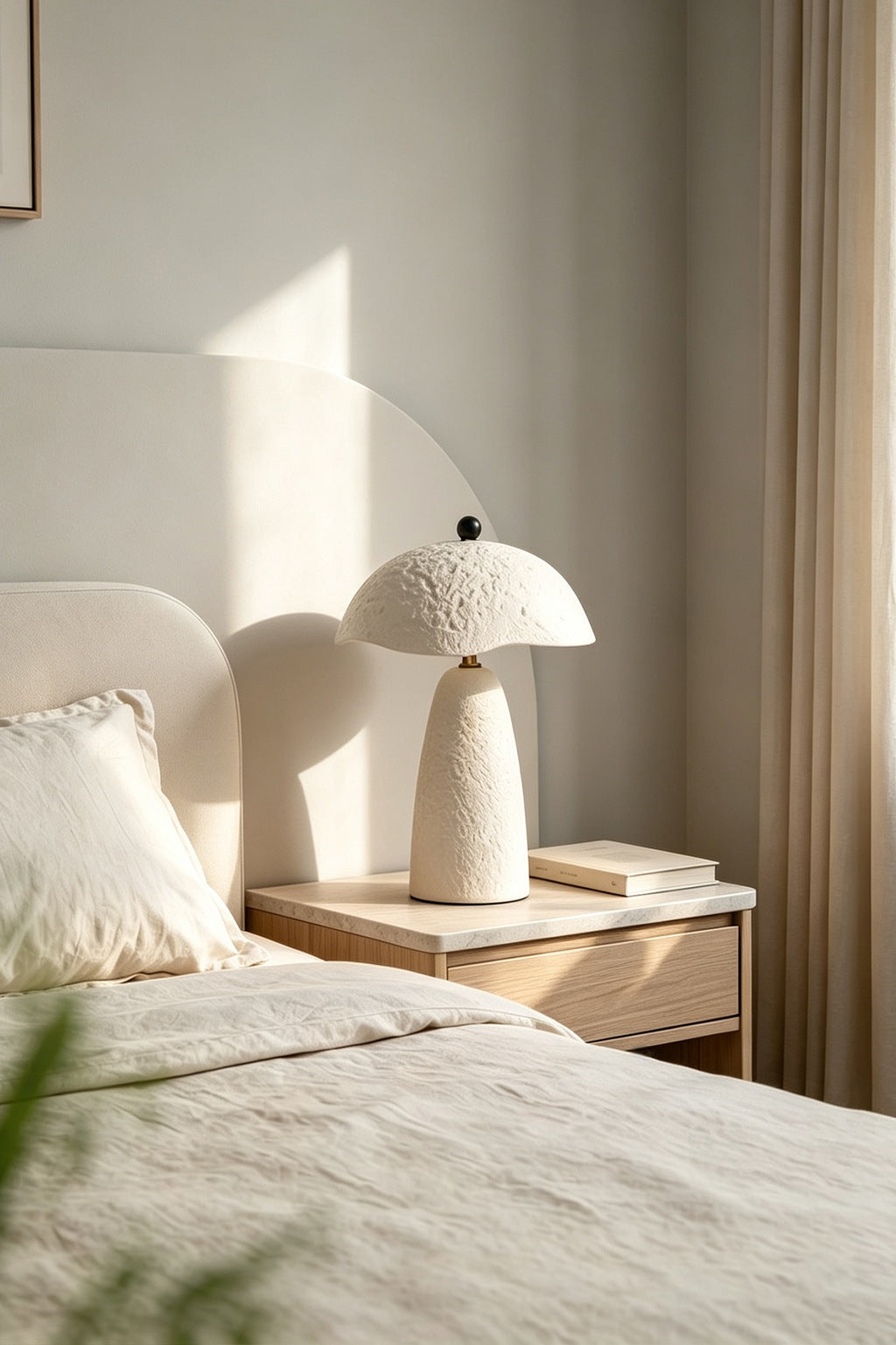 Velmurne white ceramic table lamp unlit in the original bedside scene