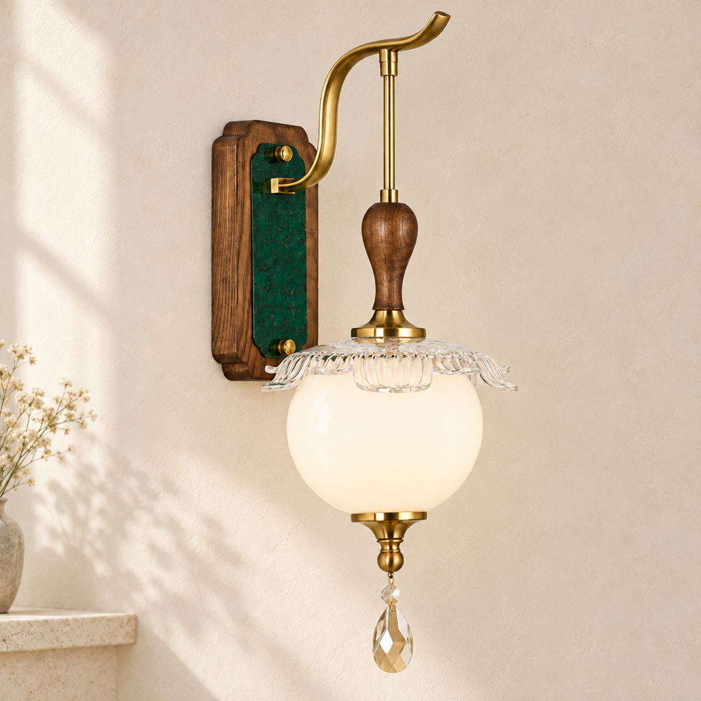 Virdelune rounded opal globe wall sconce mounted flush to a light warm-neutral wall