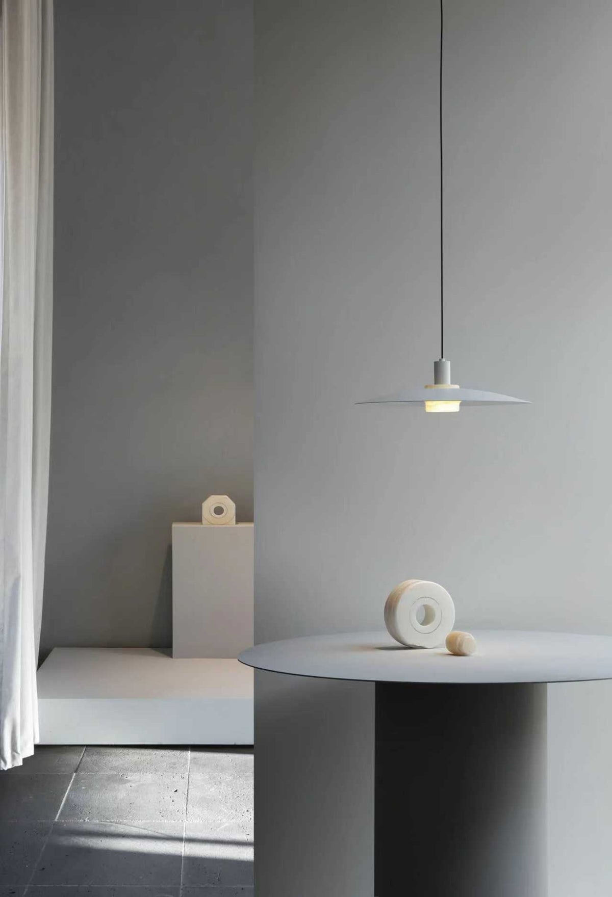 Vorylle white disc pendant light — user provided scene