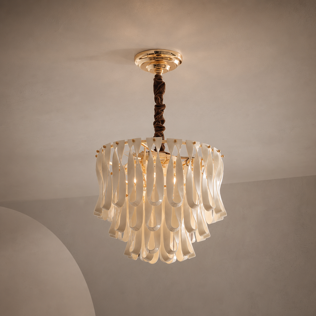 Ivory ceramic ribbon mini chandelier with warm gold-tone hardware