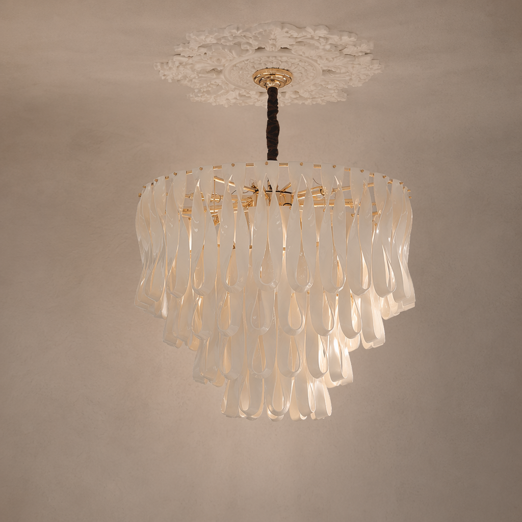 Ivory ceramic ribbon round chandelier with a warm gold-tone frame
