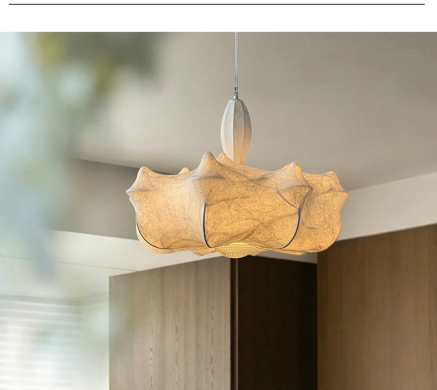 Pendant light shown over a dining area