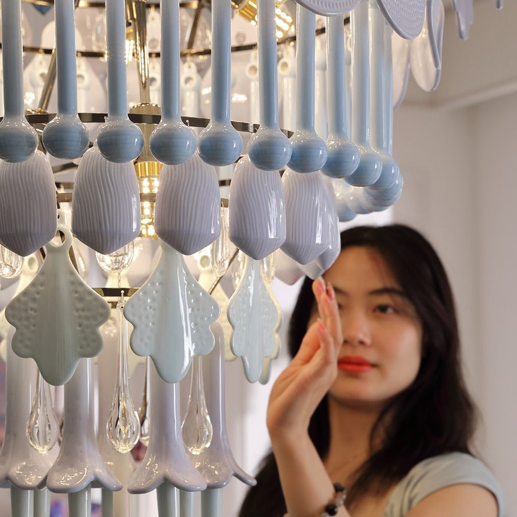 Close view of blue ceramic and glass chandelier details