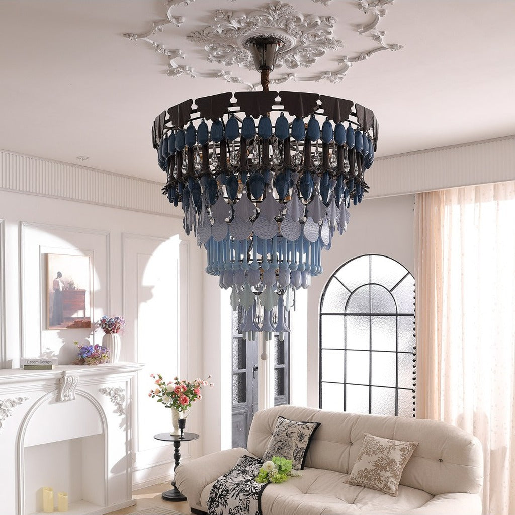 Blue lily ceramic chandelier installed in a bright sitting room