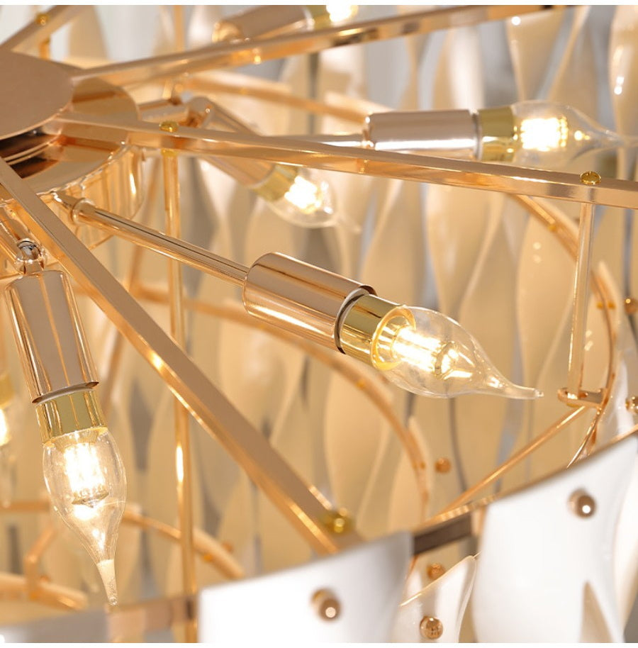 Gold-tone metal frame and E14 lamp detail inside chandelier